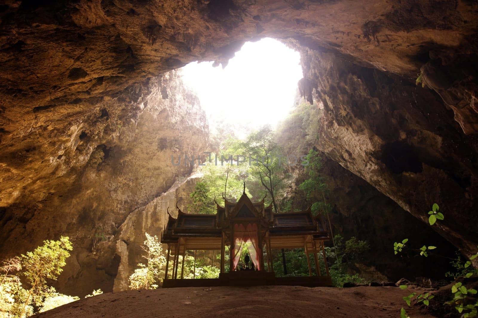 The Hoehle Tham Phraya Nakhon with the Royal Hall of Rama V from 1890 in the rocky landscape of khao Sam Roi Yot National Park on the Gulf of Thailand in the south western of Thailand in South East Asia.