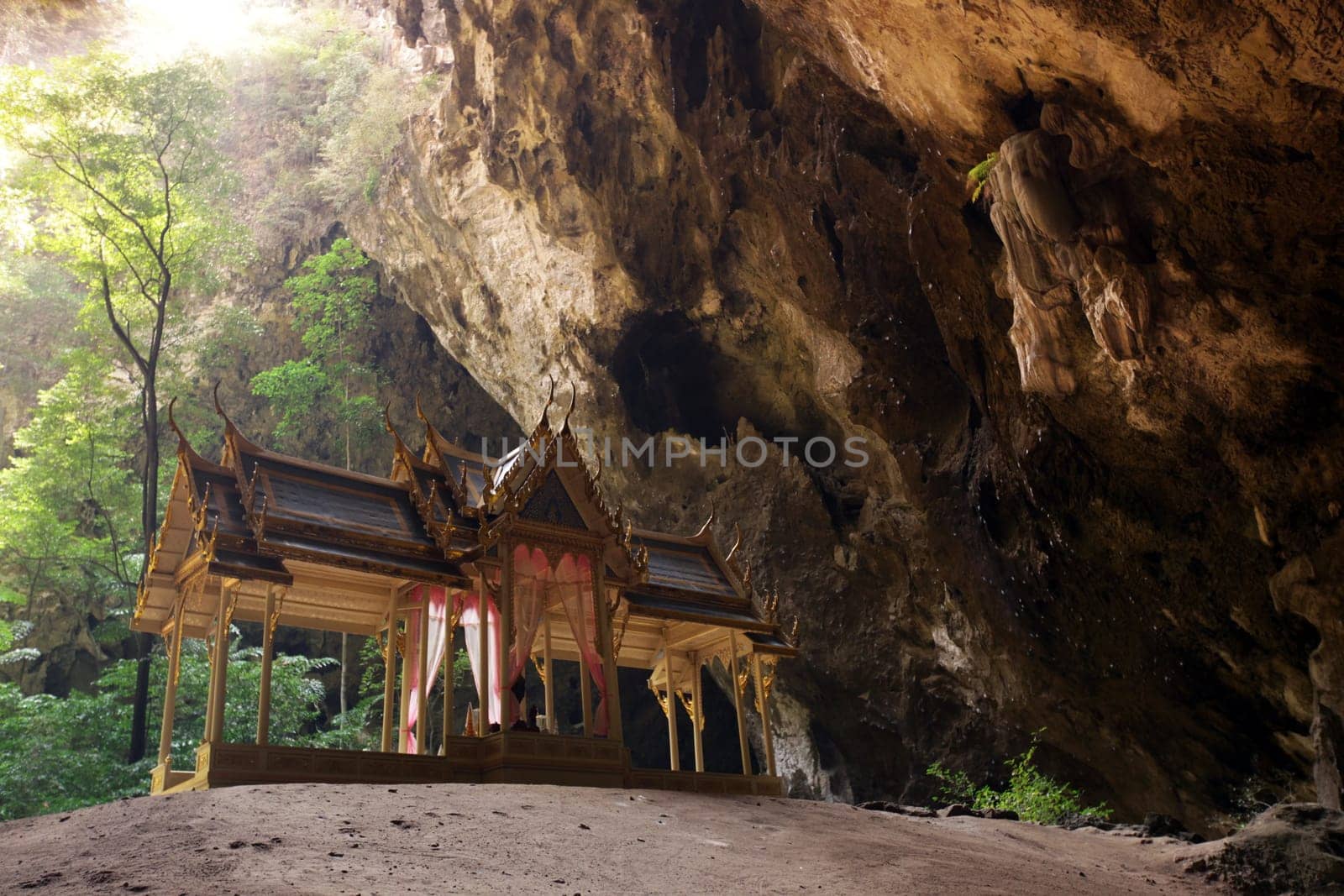 The Hoehle Tham Phraya Nakhon with the Royal Hall of Rama V from 1890 in the rocky landscape of khao Sam Roi Yot National Park on the Gulf of Thailand in the south western of Thailand in South East Asia.