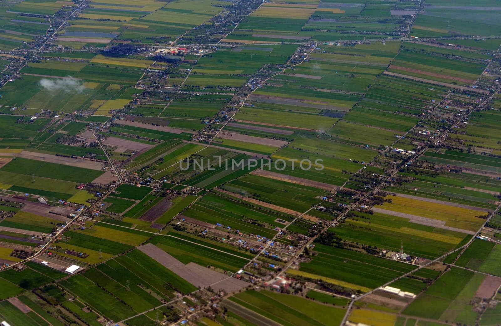 View from a plane on the flight over Chiang Mai in the north of Thailand in South East Asia.