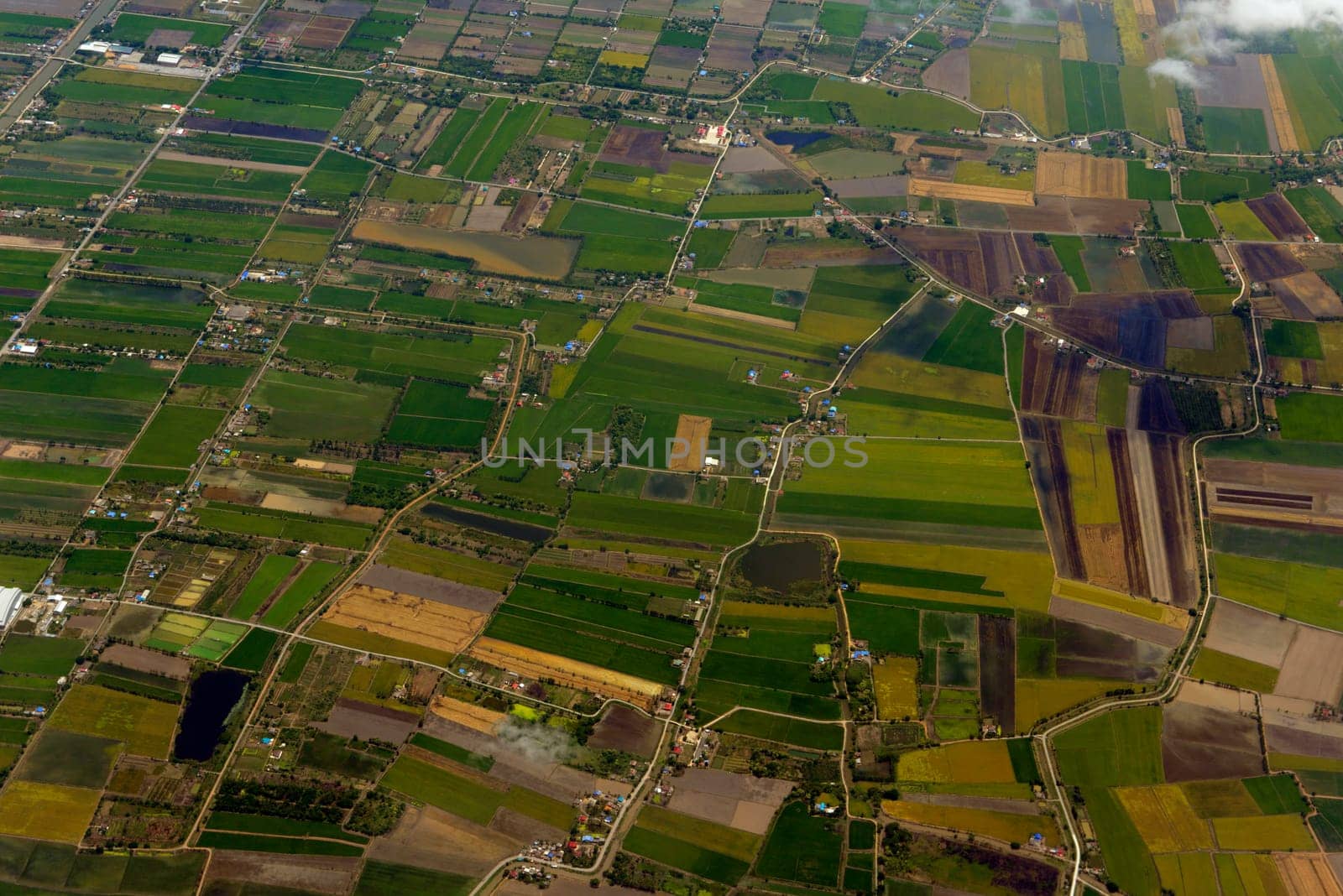 View from a plane on the flight over Chiang Mai in the north of Thailand in South East Asia.