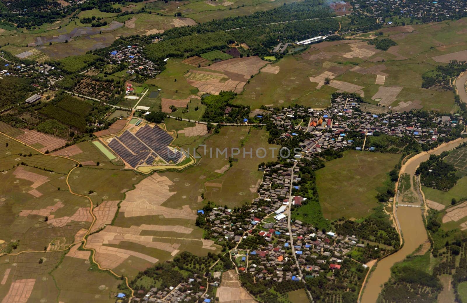 View from a plane on the flight over Chiang Mai in the north of Thailand in South East Asia.