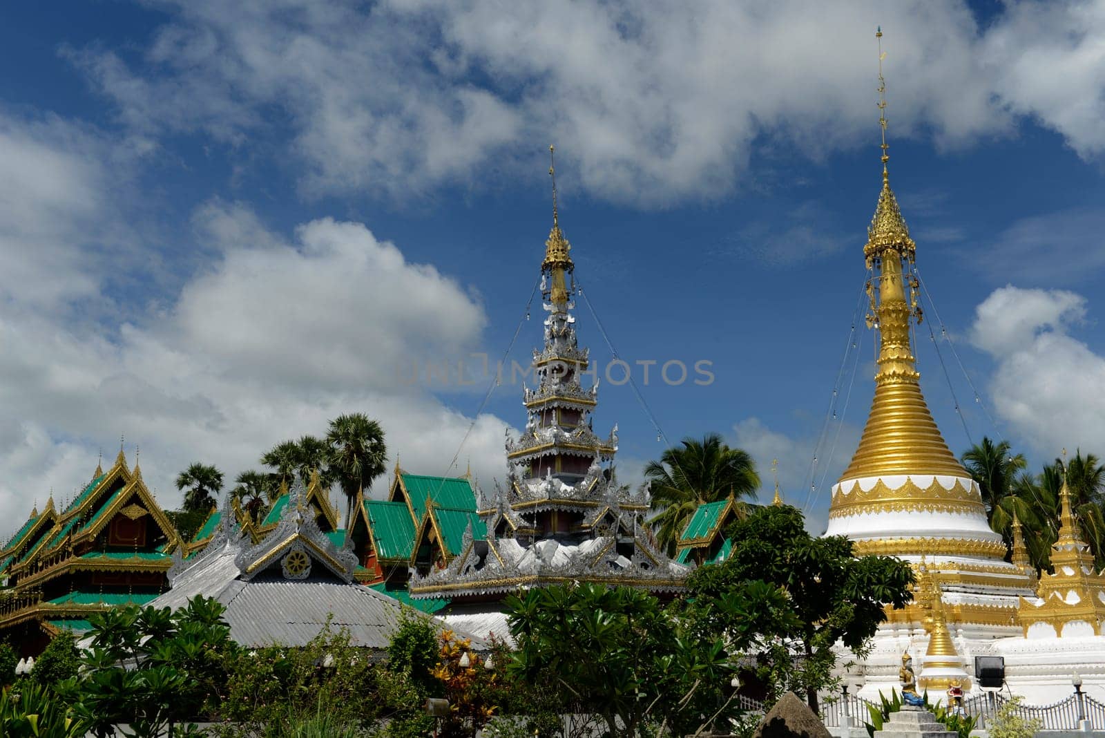 The Wat Jong Kham and Jong Klang temple on Lake Nong Jong Kham in the village of Mae Hong Son in northern Thailand in South East Asia.