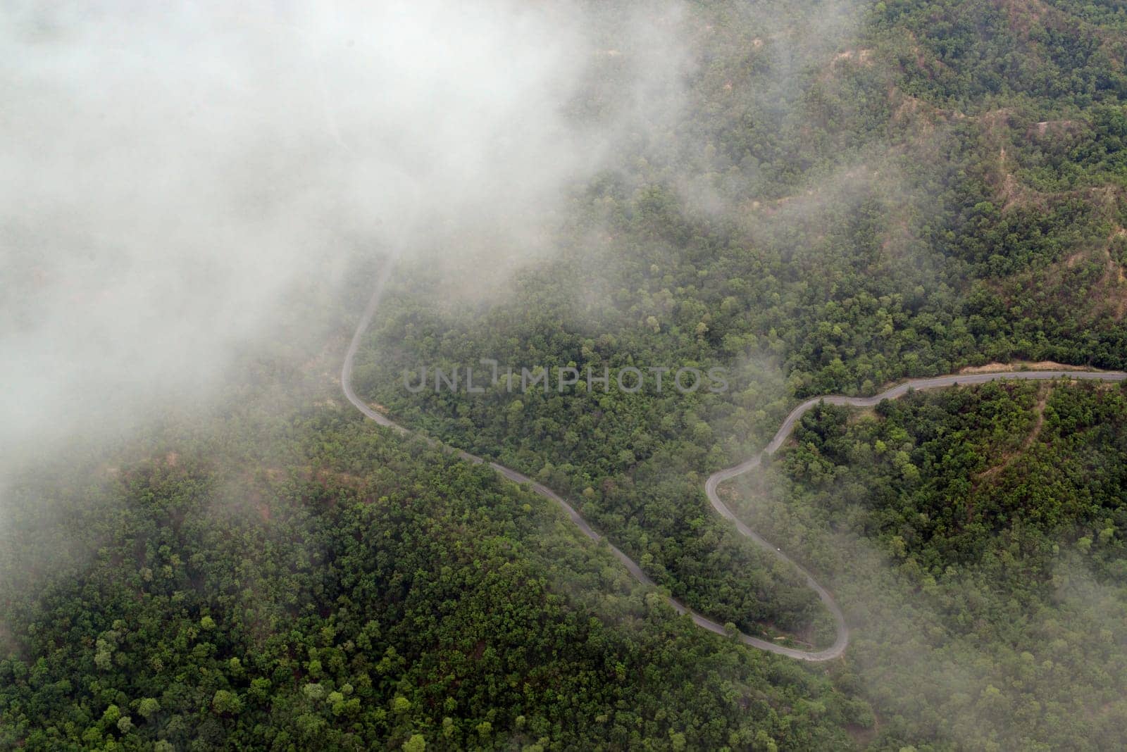 The landscape with the mountain road between Mae Hong on and pai in the mountain oust of Mae Hong Son in the north of Thailand in South East Asia.