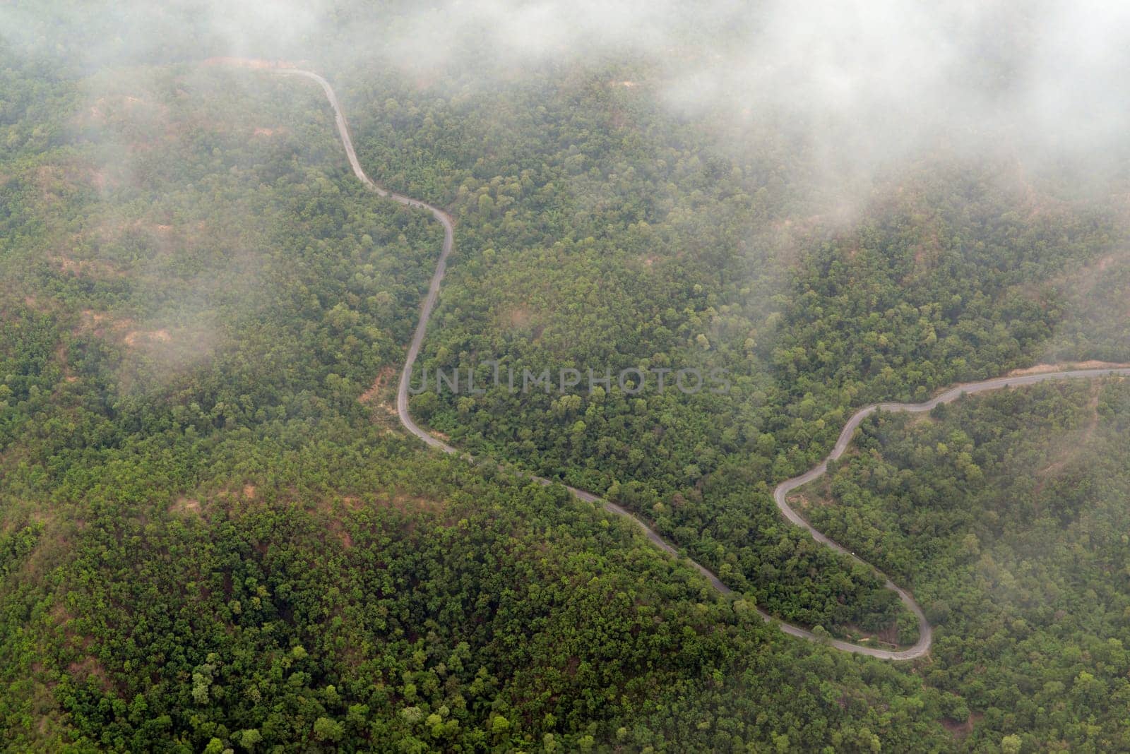 The landscape with the mountain road between Mae Hong on and pai in the mountain oust of Mae Hong Son in the north of Thailand in South East Asia.