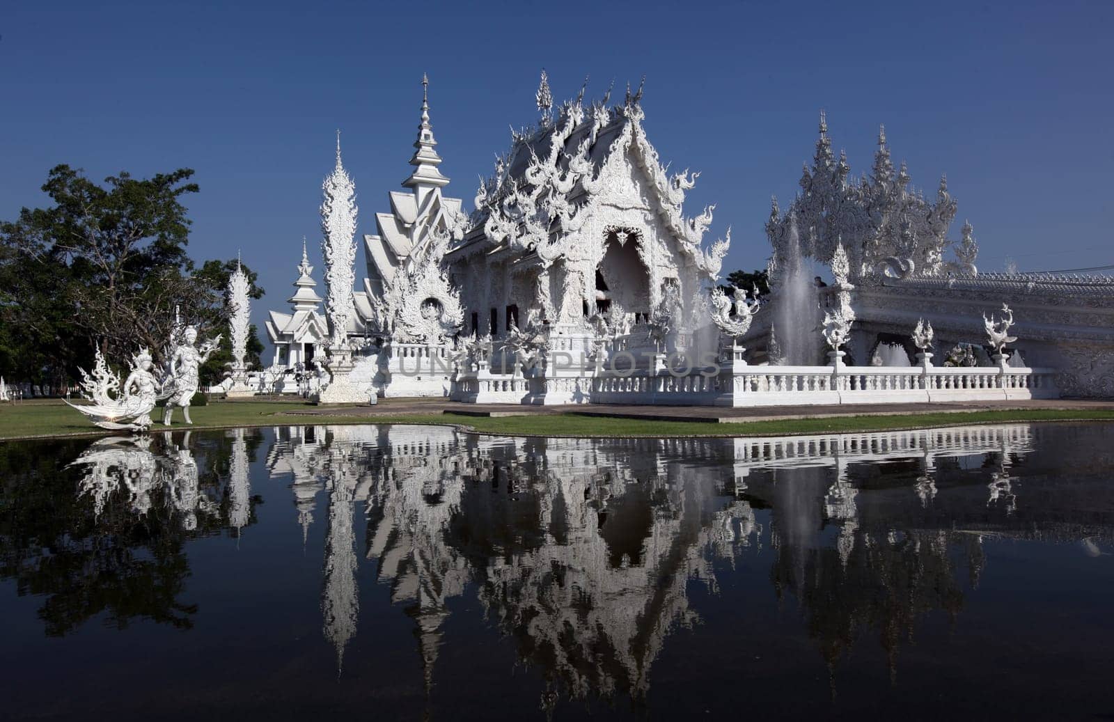 The temple Wat Rong Khun 12 km south of Chiang Rai in the province of chiang Rai in the north of Thailand in South East Asia.