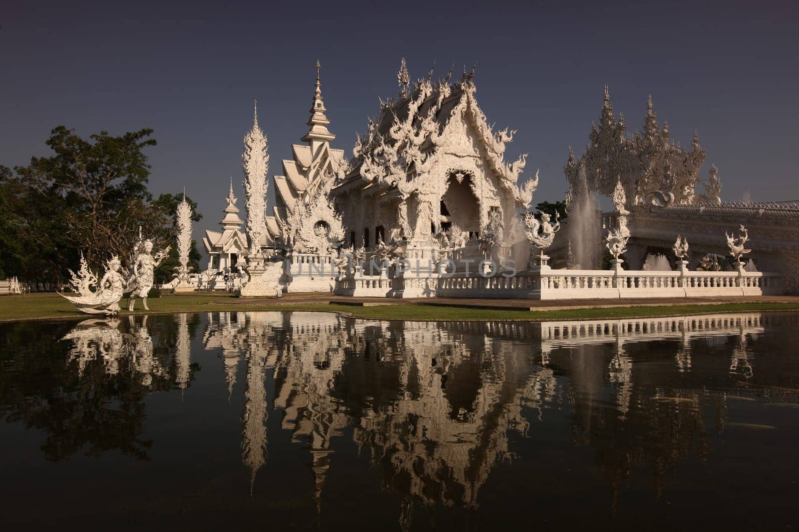 The temple Wat Rong Khun 12 km south of Chiang Rai in the province of chiang Rai in the north of Thailand in South East Asia.