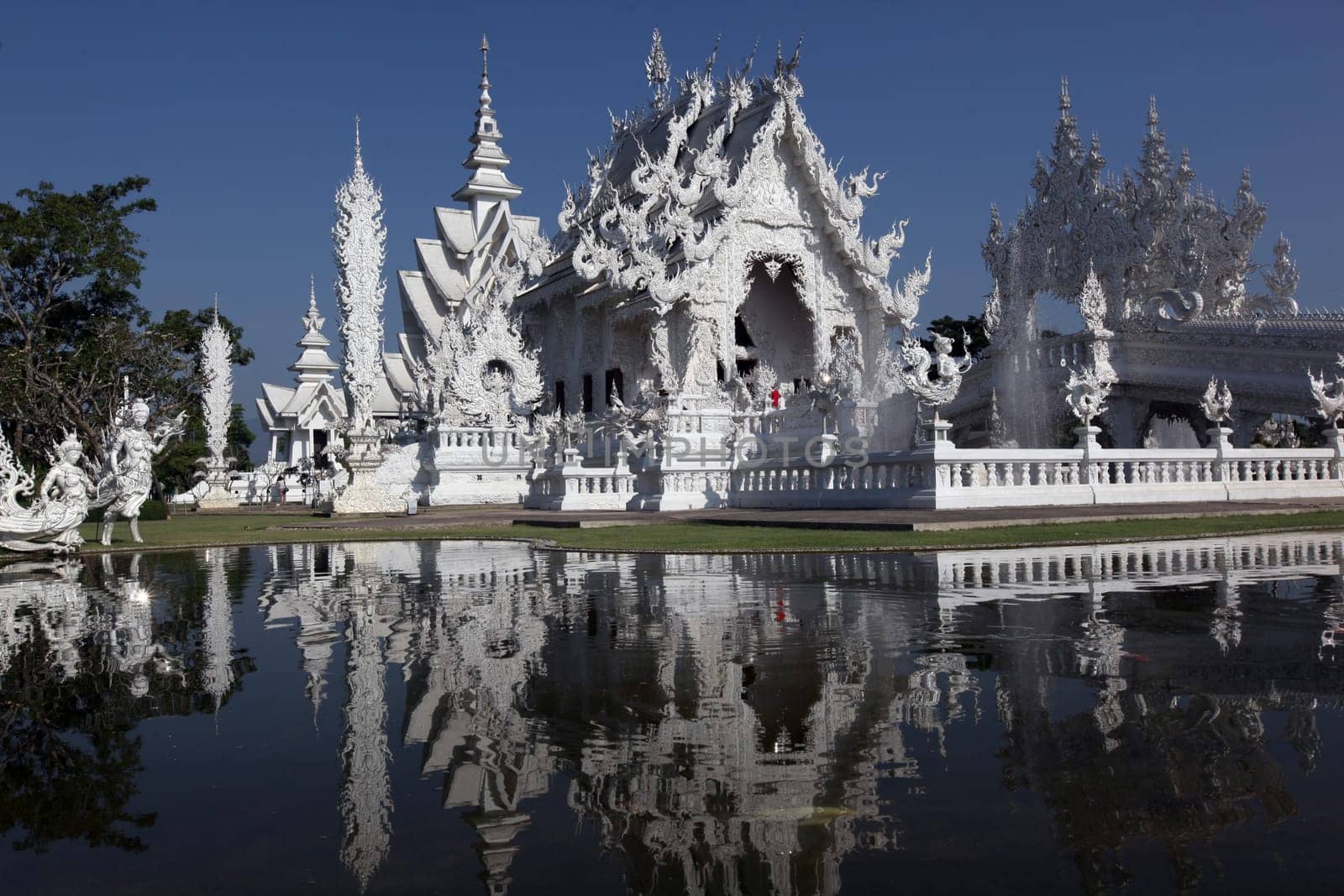The temple Wat Rong Khun 12 km south of Chiang Rai in the province of chiang Rai in the north of Thailand in South East Asia.