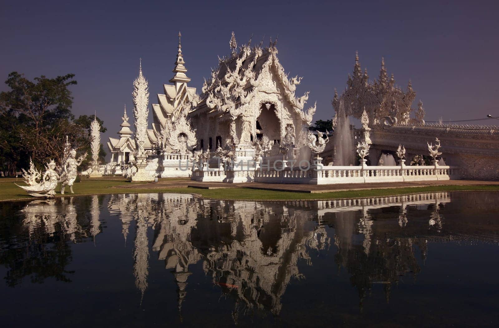 The temple Wat Rong Khun 12 km south of Chiang Rai in the province of chiang Rai in the north of Thailand in South East Asia.