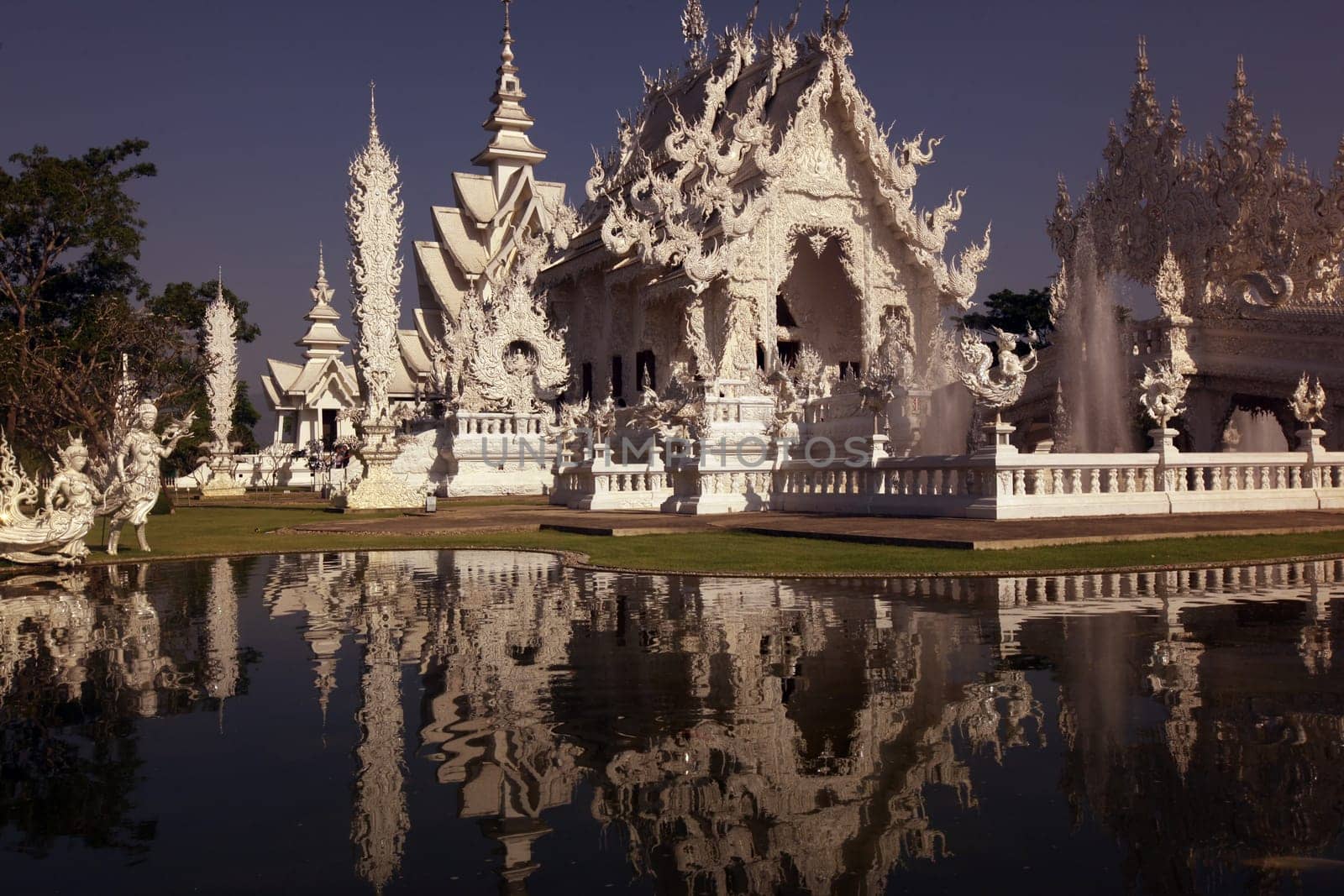The temple Wat Rong Khun 12 km south of Chiang Rai in the province of chiang Rai in the north of Thailand in South East Asia.