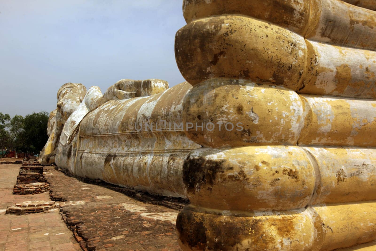 The Reclining Buddha at Wat Lokaya Sutha Temple in the temple city of Ayutthaya,Thailand.