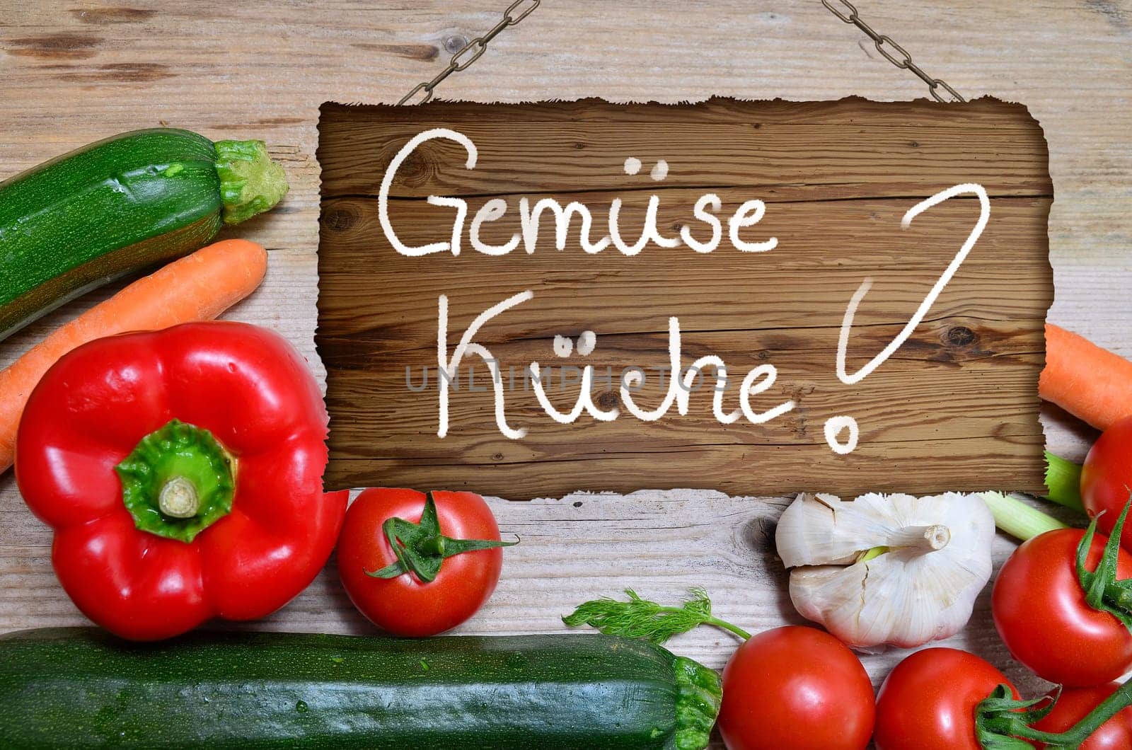 Table of fresh vegetables on wooden board