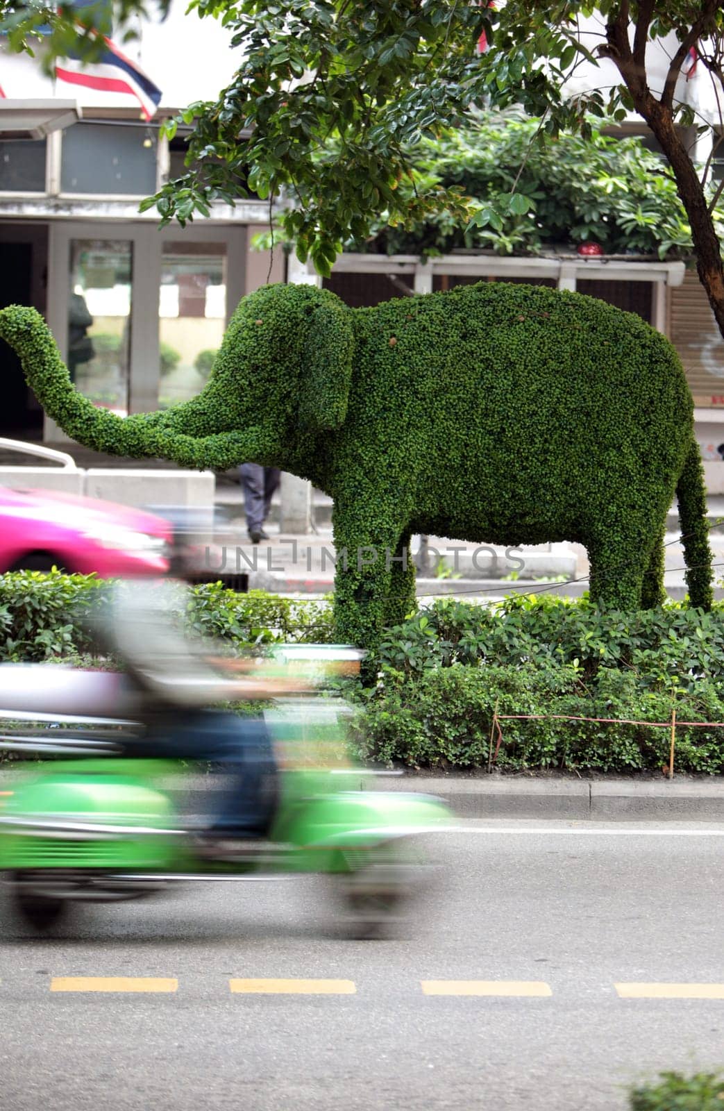 Road traffic in Siam Square in the center of Bangkok,the capital of Thailand in South East Asia.