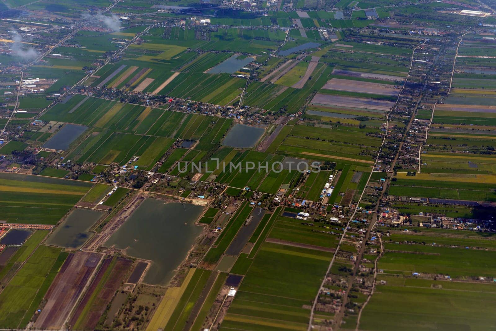 The landscape with agricultural operated east of the capital Bangkok of Thailand in South East Asia.