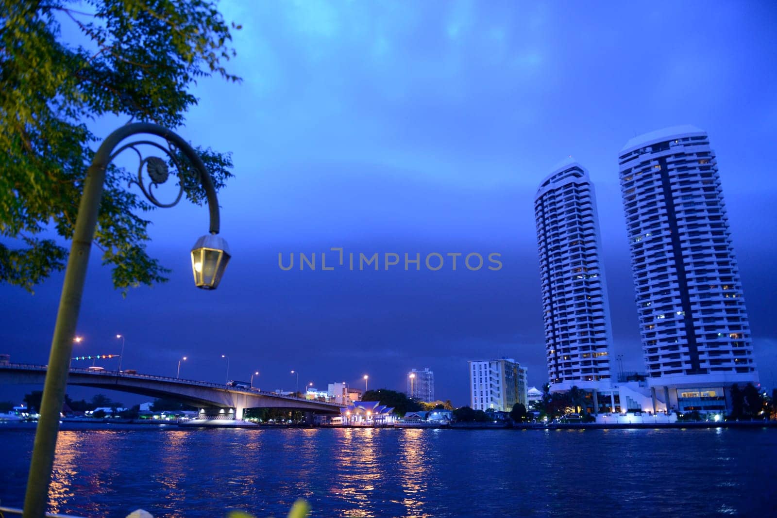 An apartment house at Mae Nam Chao Phraya in the capital Bangkok of Thailand in South East Asia.