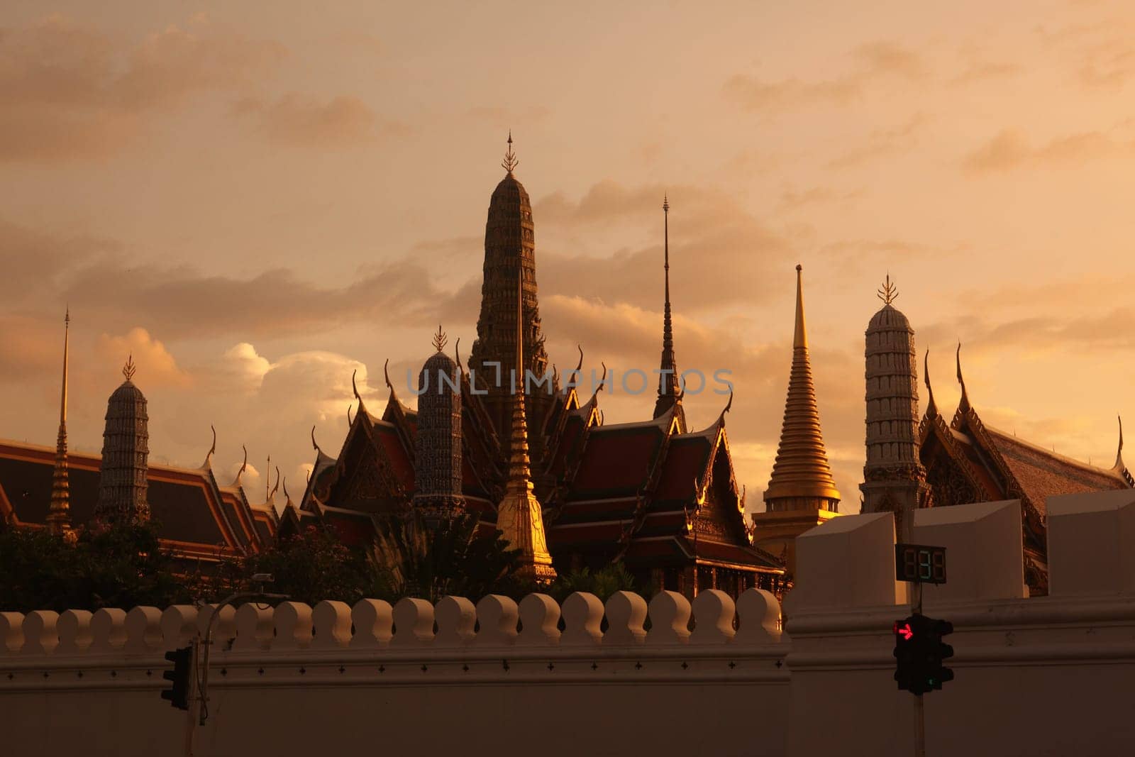 The temple gelaende in the evening atmosphere with Wat Phra Keo at the Royal Palace in the historical center of the capital Bangkok in Thailand.