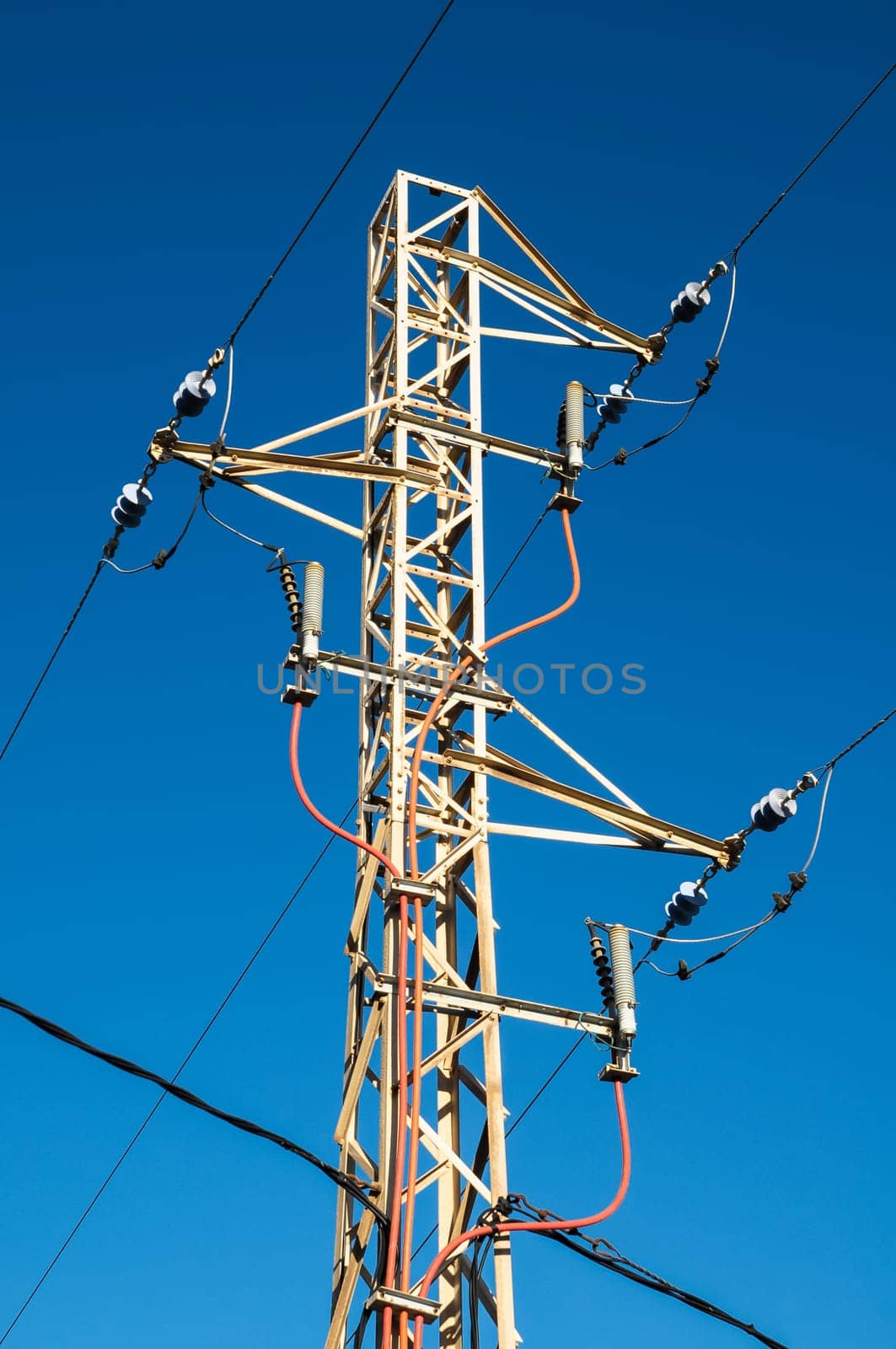 Energy Electricity Power Pylon on a Blue Sky