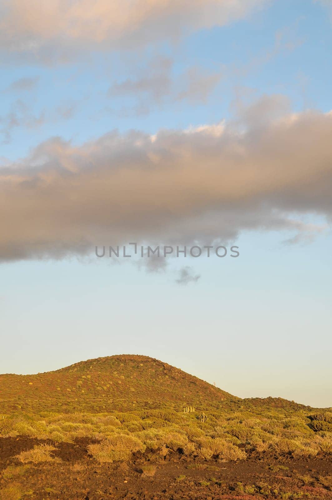 Cloudscape, Colored Clouds at Sunset near the Ocean