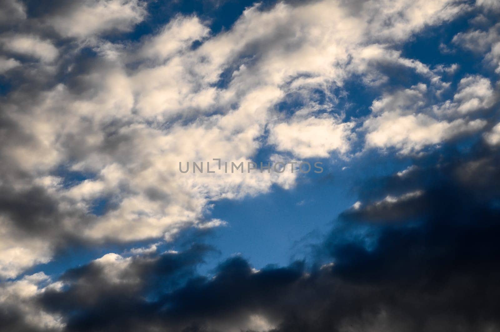 Cloudscape, Colored Clouds at Sunset near the Ocean
