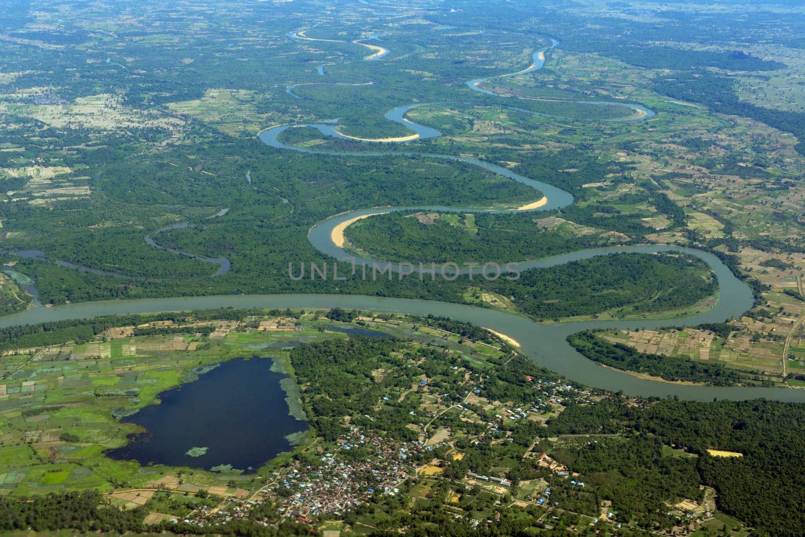 The landscape of an airplane over the surroundings of Ubon Ratchathani in the northeast of Thailand in South East Asia.