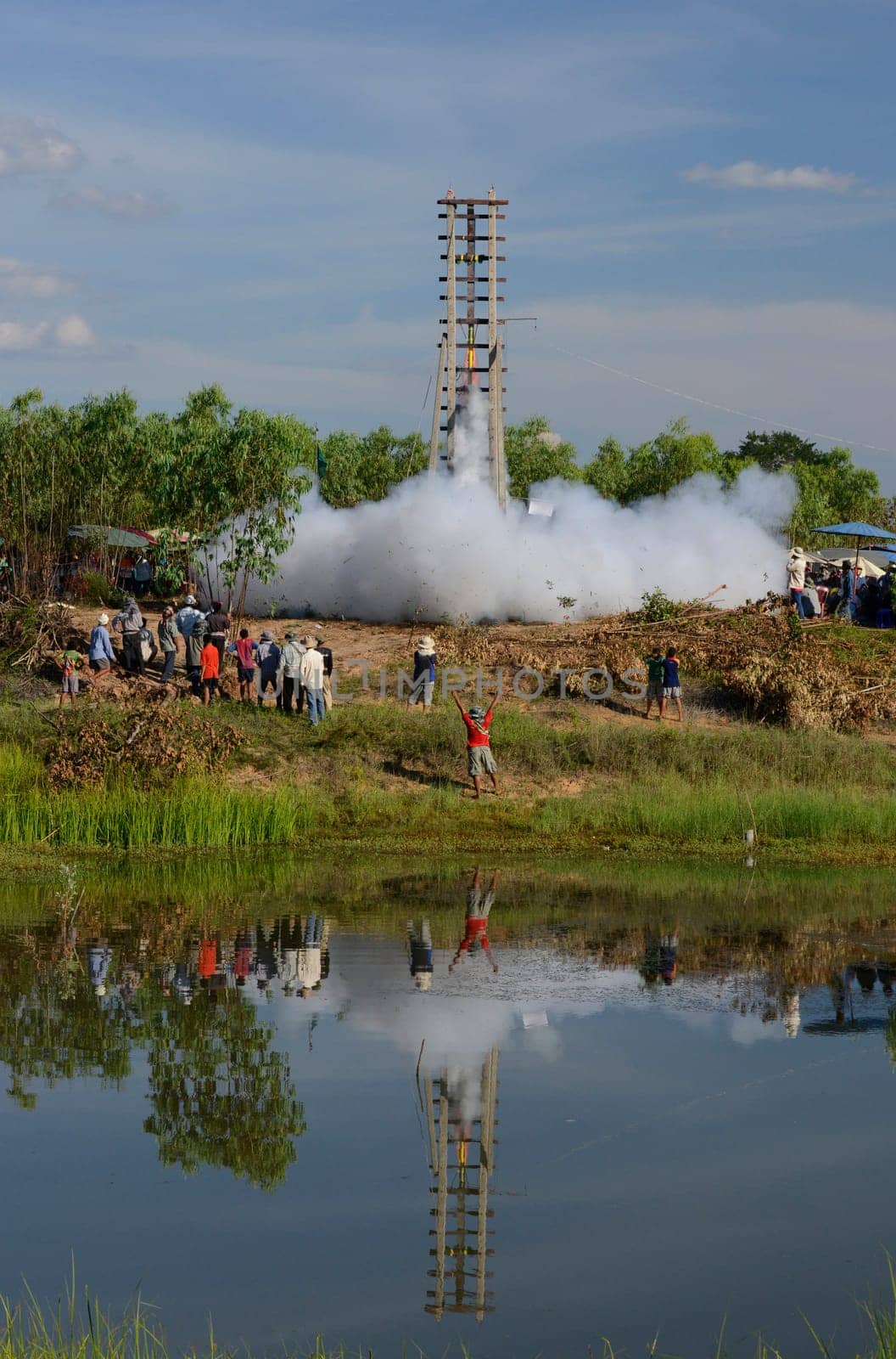 A racket starts at the traditional rocket festival or Bun Bang Fai or Rocket Festival in Ban Si Than in Amnat Charoen province northwest of Ubon Ratchathani in northeastern Thailand in South East Asia.