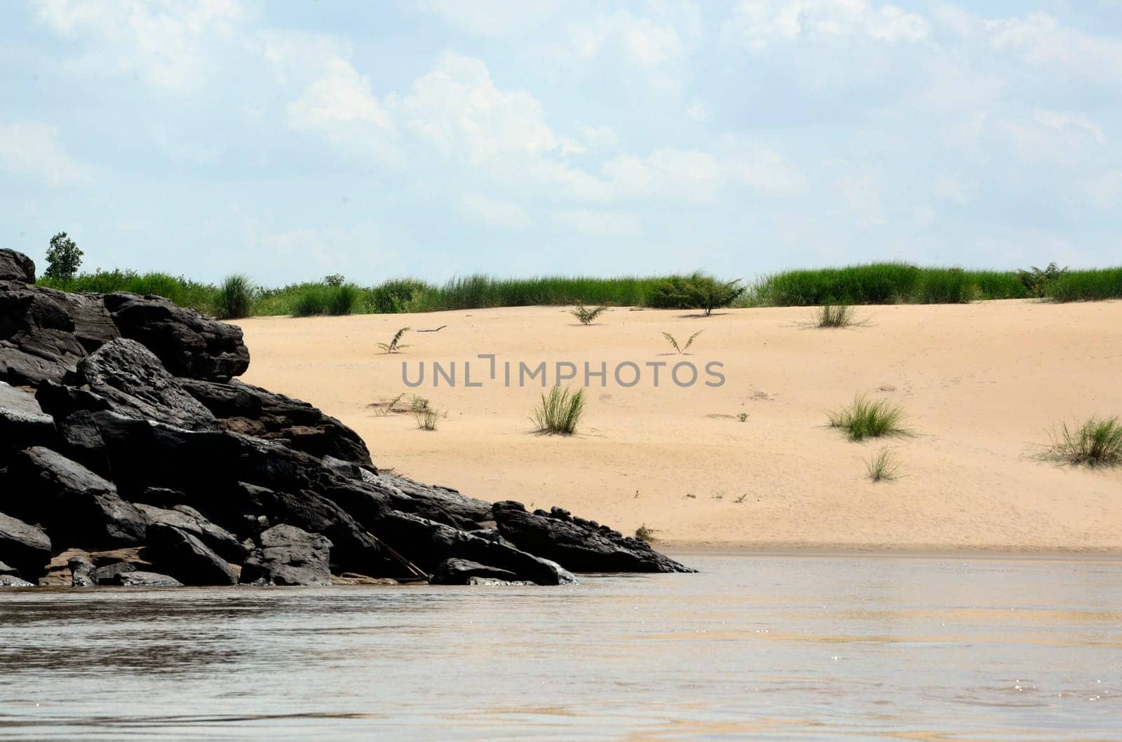The stone landscape with a sandy beach in the Mekong River of the Natural Park Sam Phan Bok near Lakhon Pheng on the Mekong River in the province of Amnat Charoen northwest of Ubon Ratchathani in northeastern Thailand in South East Asia.