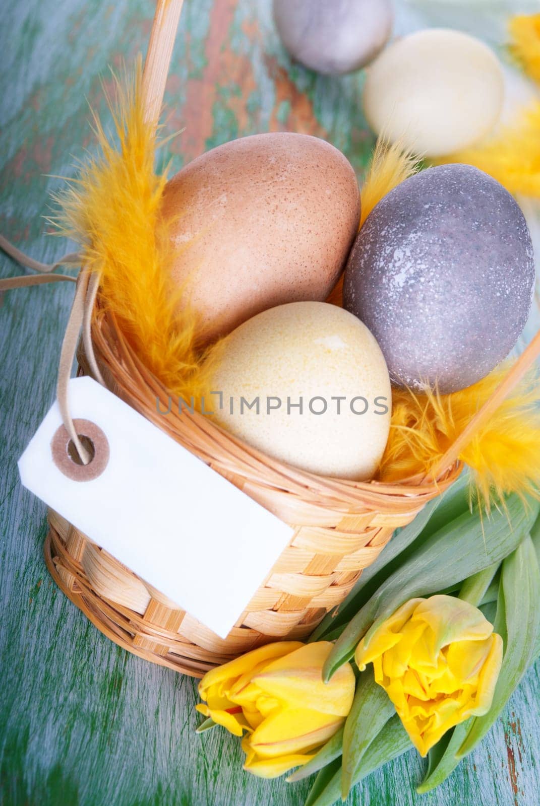 Easter Eggs in a Basket with Blank Label and Copy Space