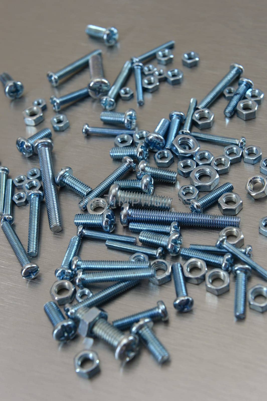 Nuts and bolts isolated against a white background