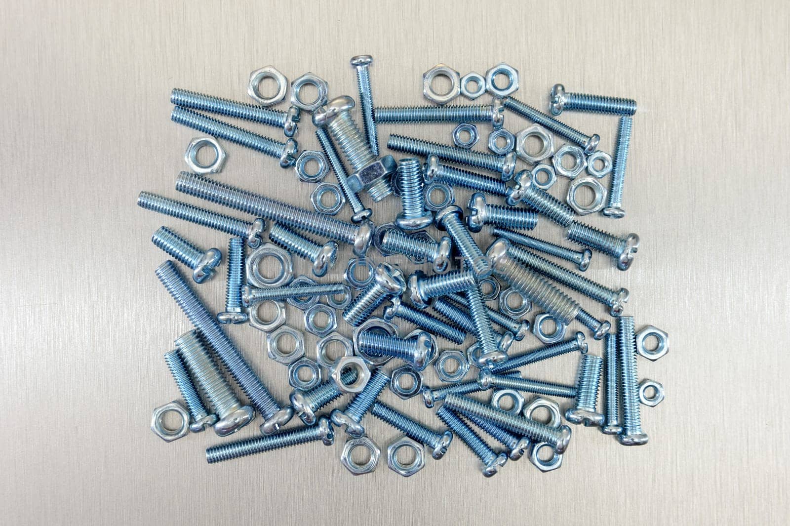 Nuts and bolts isolated against a white background