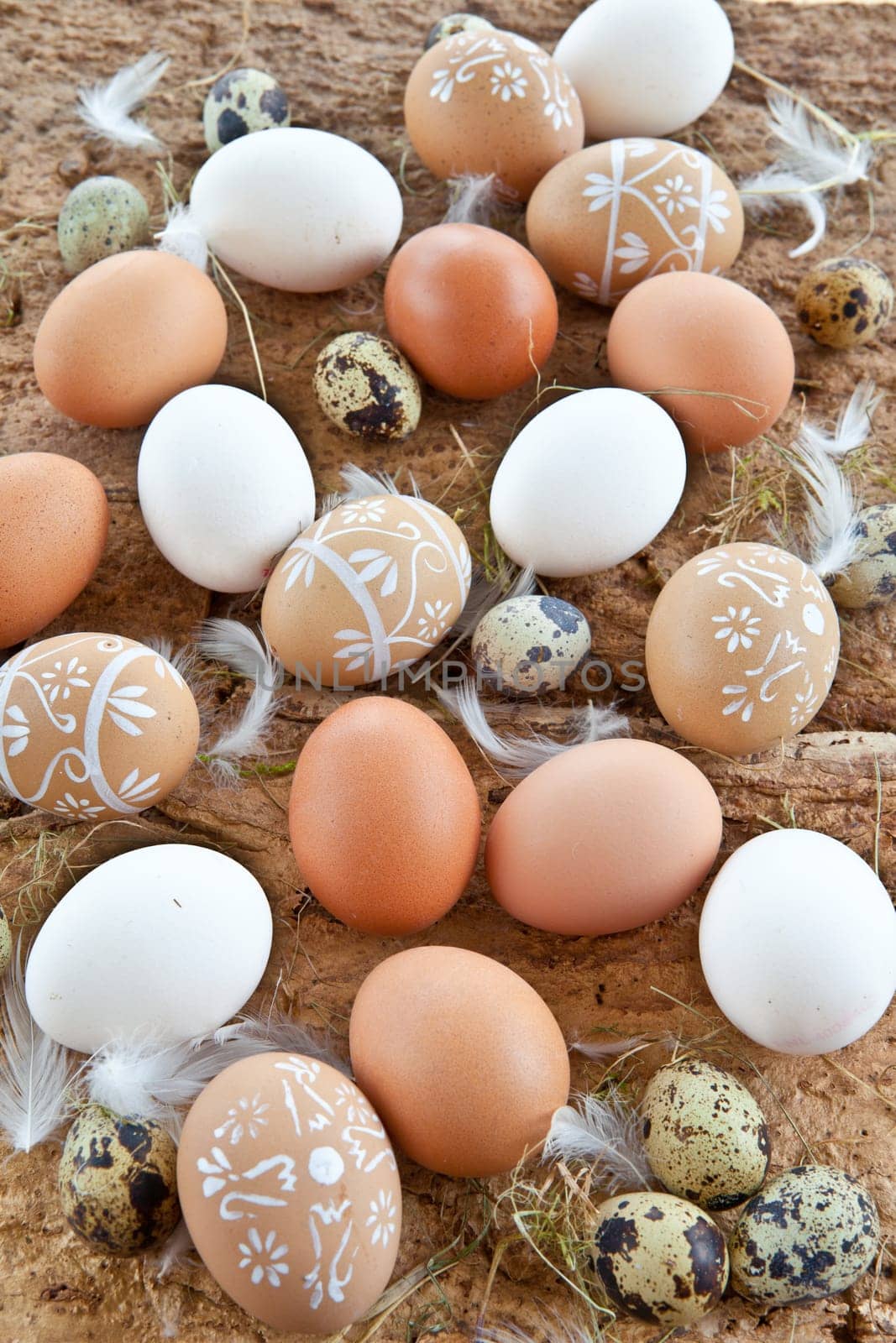 Rustic background with different eggs