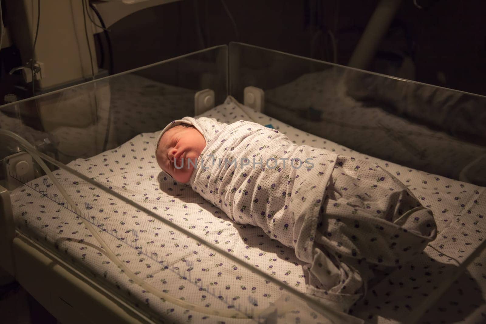 Just born baby boy at ICU in hospital.