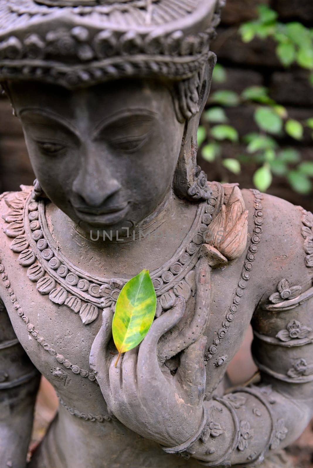 Traditional figures are available for sale in the garden of Ban Phor Linag Meun's Terracota Art at Terracota Garden in Chiang Mai in northern Thailand in South East Asia.
