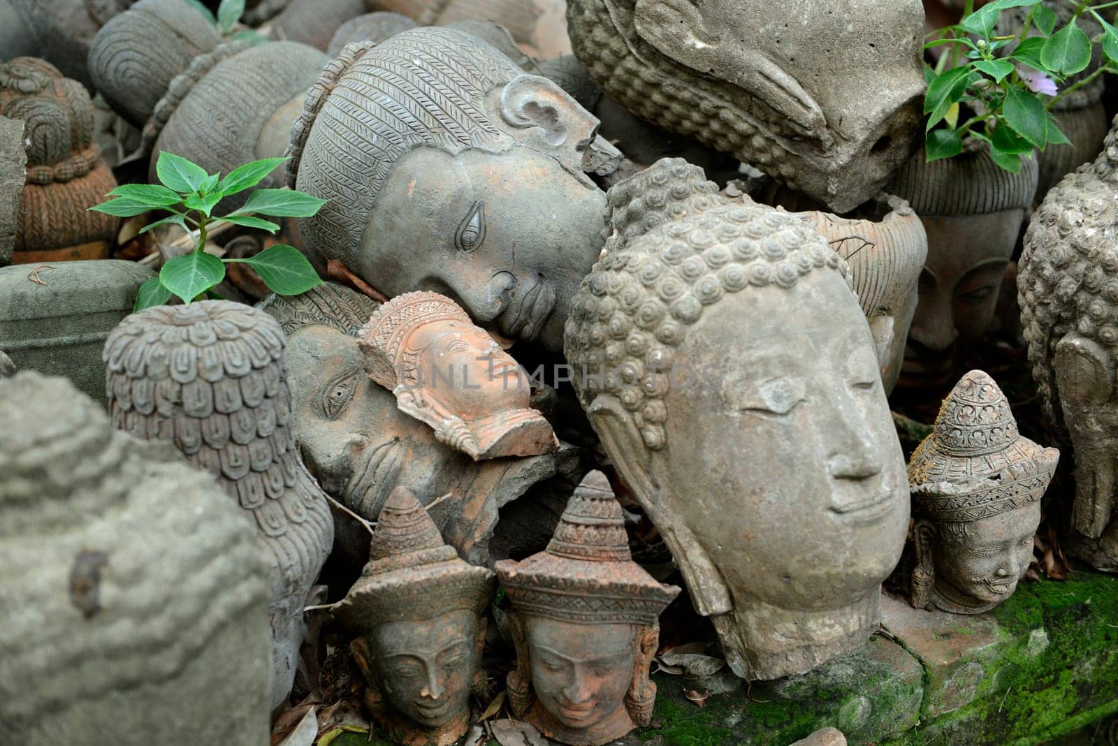 Traditional figures are available for sale in the garden of Ban Phor Linag Meun's Terracota Art at Terracota Garden in Chiang Mai in northern Thailand in South East Asia.