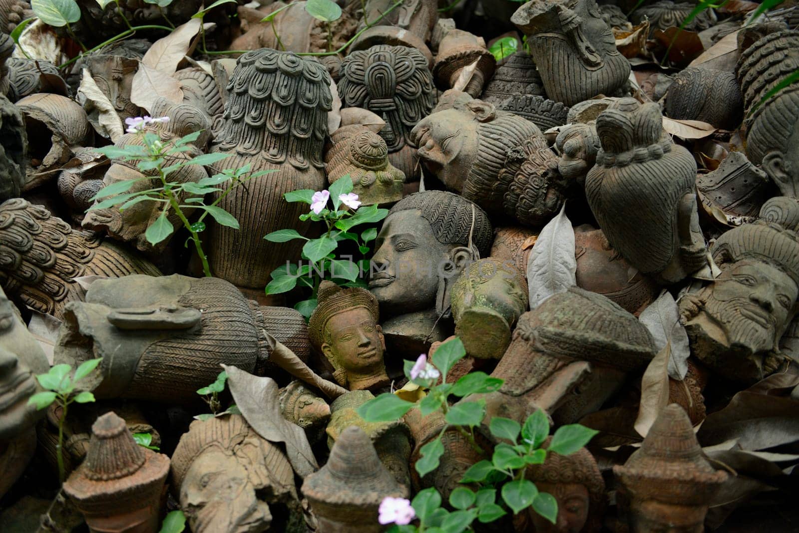 Traditional figures are available for sale in the garden of Ban Phor Linag Meun's Terracota Art at Terracota Garden in Chiang Mai in northern Thailand in South East Asia.