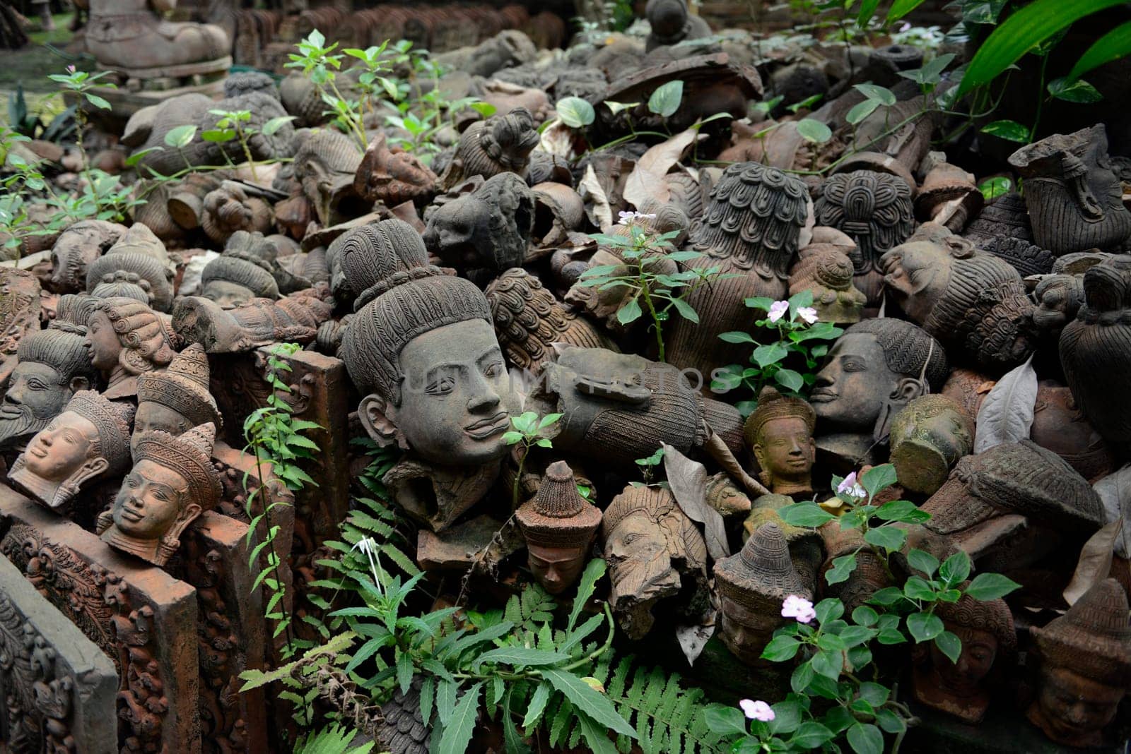 Traditional figures are available for sale in the garden of Ban Phor Linag Meun's Terracota Art at Terracota Garden in Chiang Mai in northern Thailand in South East Asia.