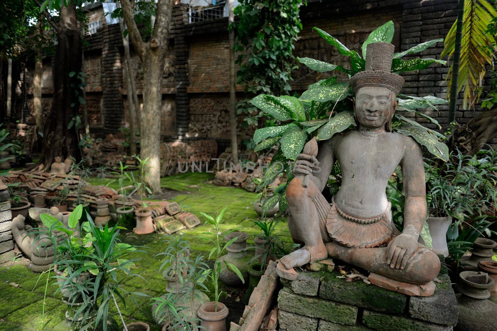 Traditional figures are available for sale in the garden of Ban Phor Linag Meun's Terracota Art at Terracota Garden in Chiang Mai in northern Thailand in South East Asia.