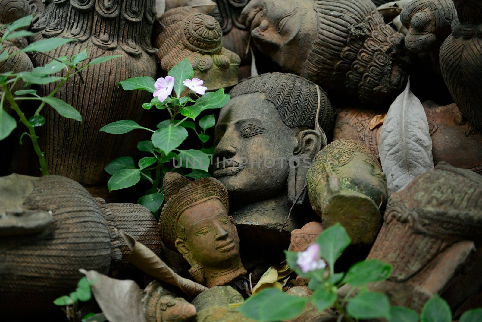 Traditional figures are available for sale in the garden of Ban Phor Linag Meun's Terracota Art at Terracota Garden in Chiang Mai in northern Thailand in South East Asia.