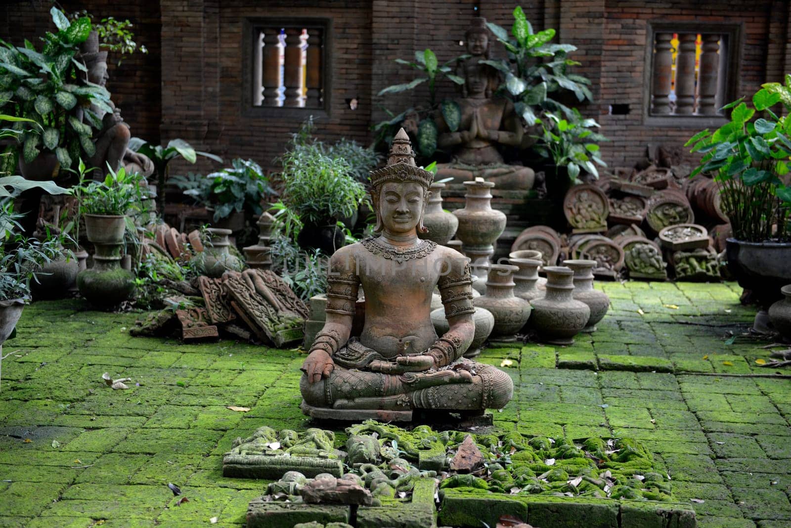 Traditional figures are available for sale in the garden of Ban Phor Linag Meun's Terracota Art at Terracota Garden in Chiang Mai in northern Thailand in South East Asia.