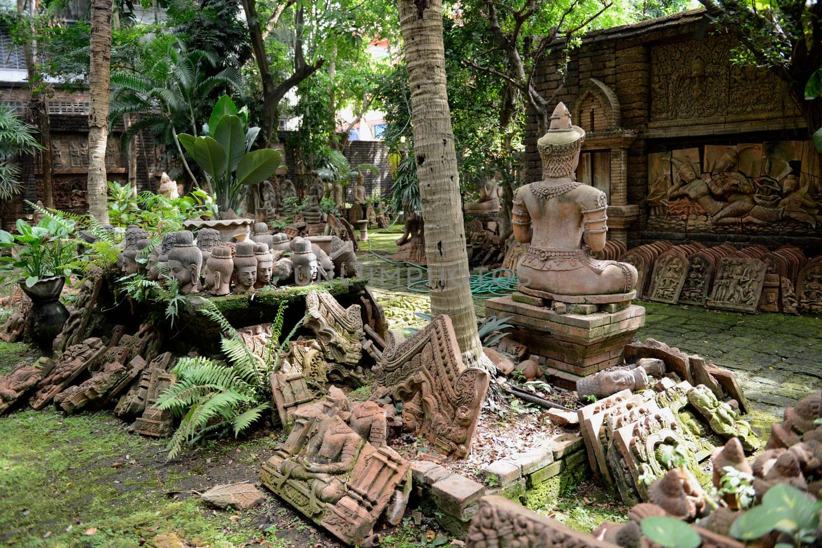 Traditional figures are available for sale in the garden of Ban Phor Linag Meun's Terracota Art at Terracota Garden in Chiang Mai in northern Thailand in South East Asia.