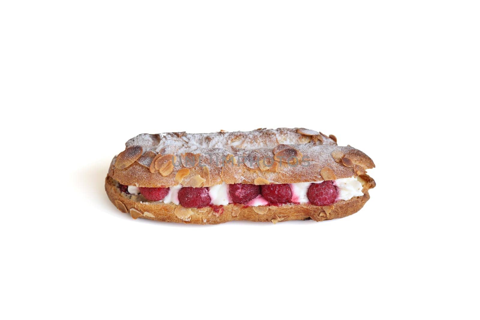 Details of a delicious pastry confectioned with raspberry and chantilly cream.