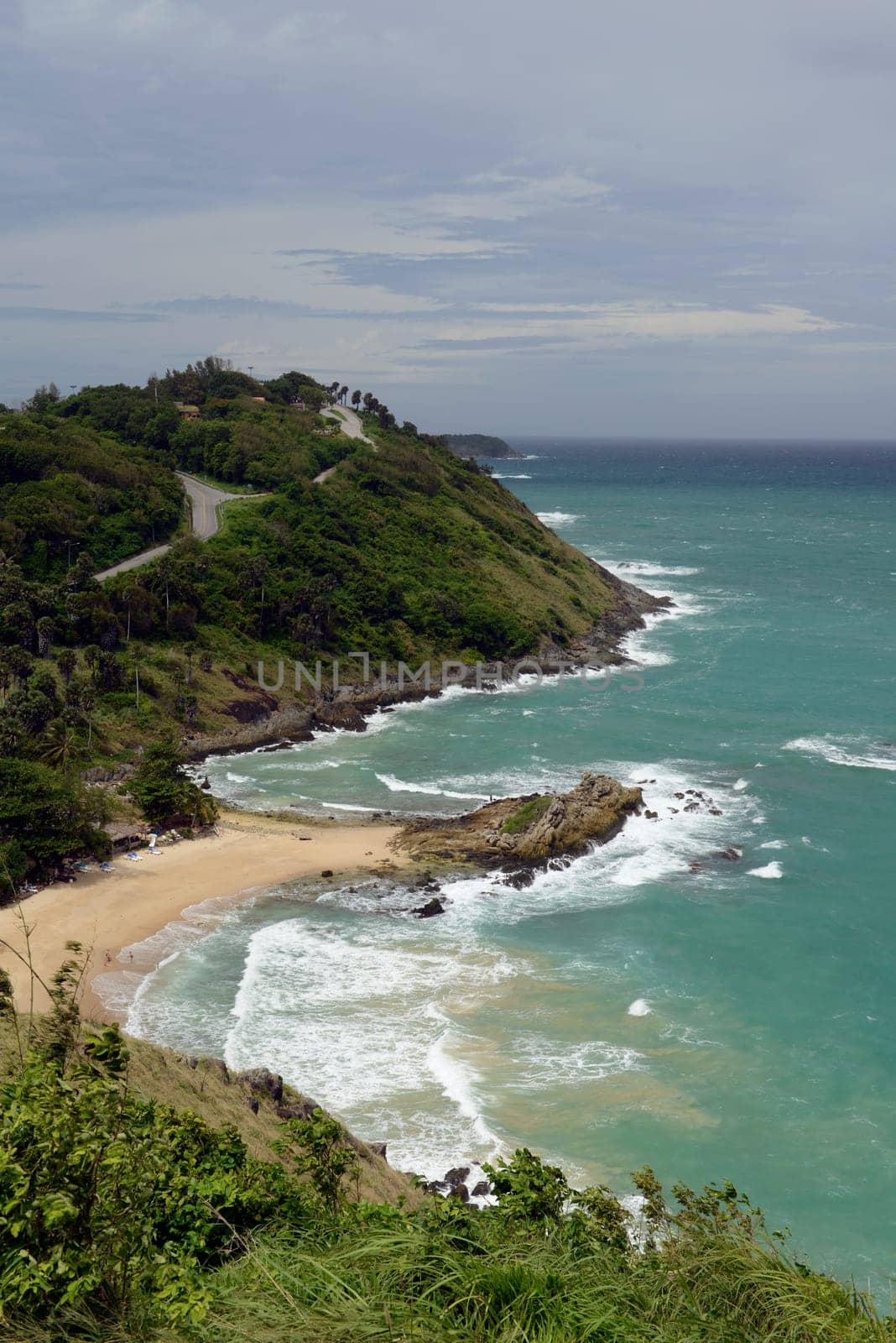 A beach in Hat Nai Harn in the south of phuket island in southern Thailand in South East Asia.