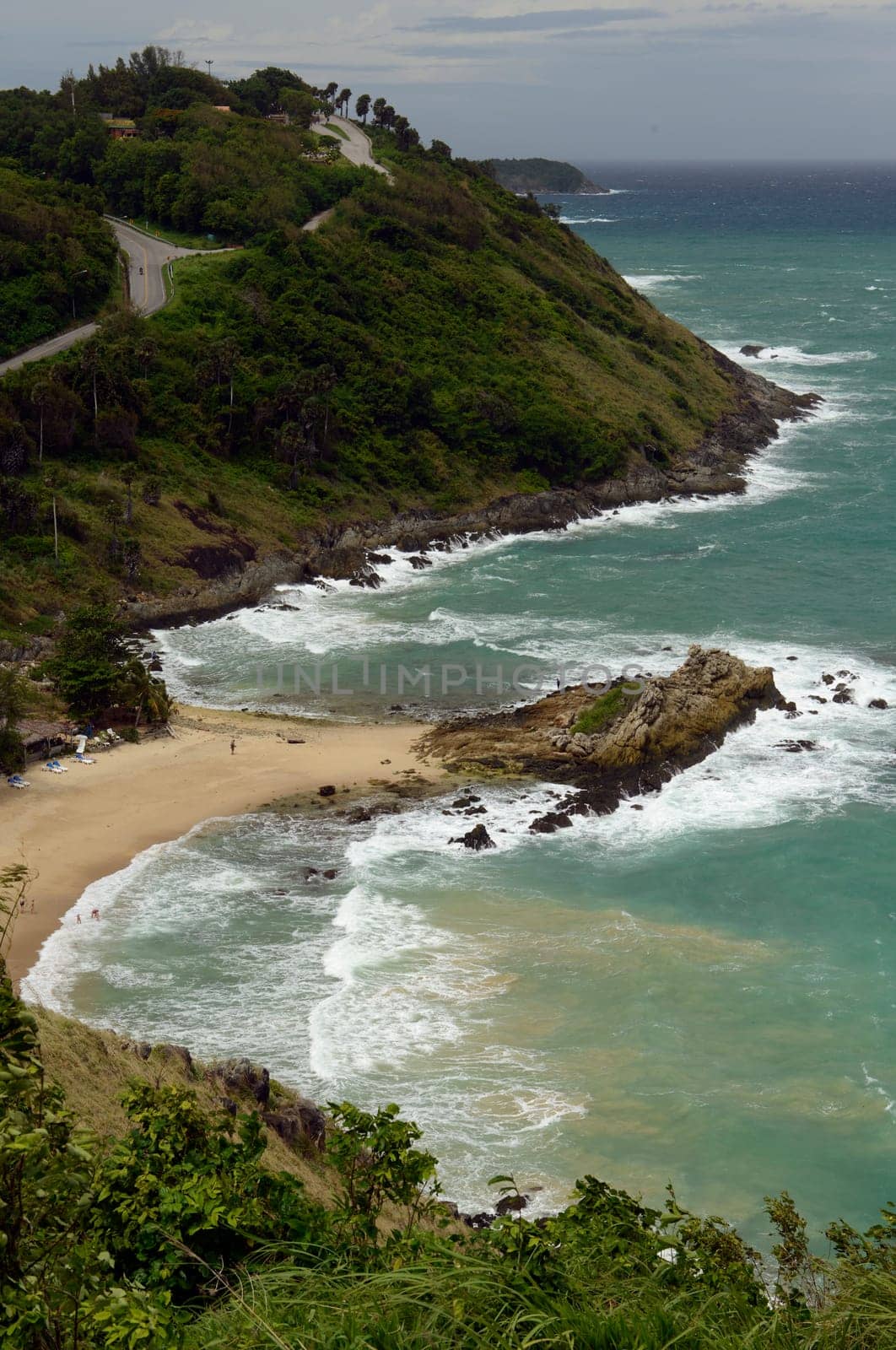 A beach in Hat Nai Harn in the south of phuket island in southern Thailand in South East Asia.