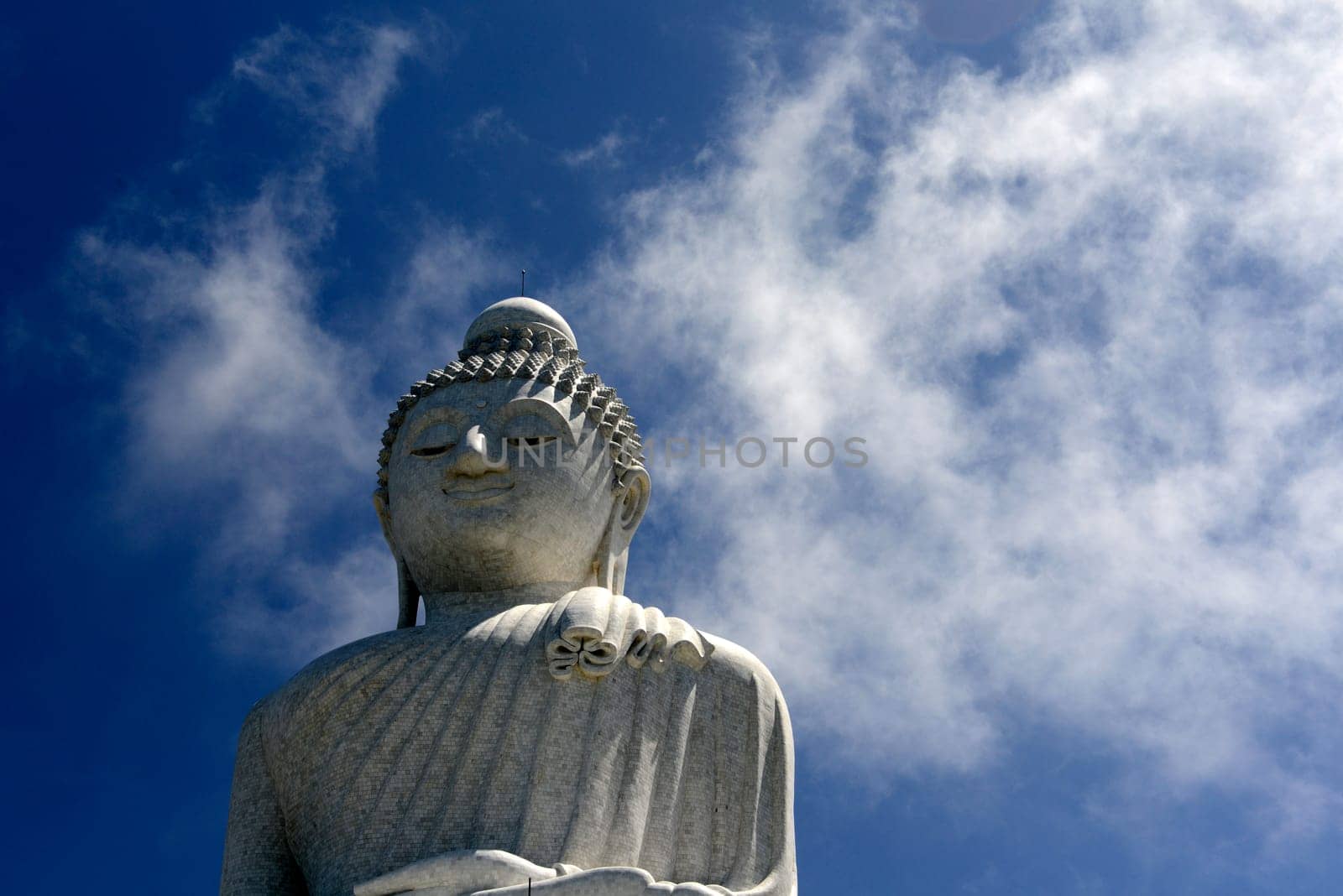 The Great Buddha at Wat Chalong in the mountains in the south of phuket island in southern Thailand in South East Asia.