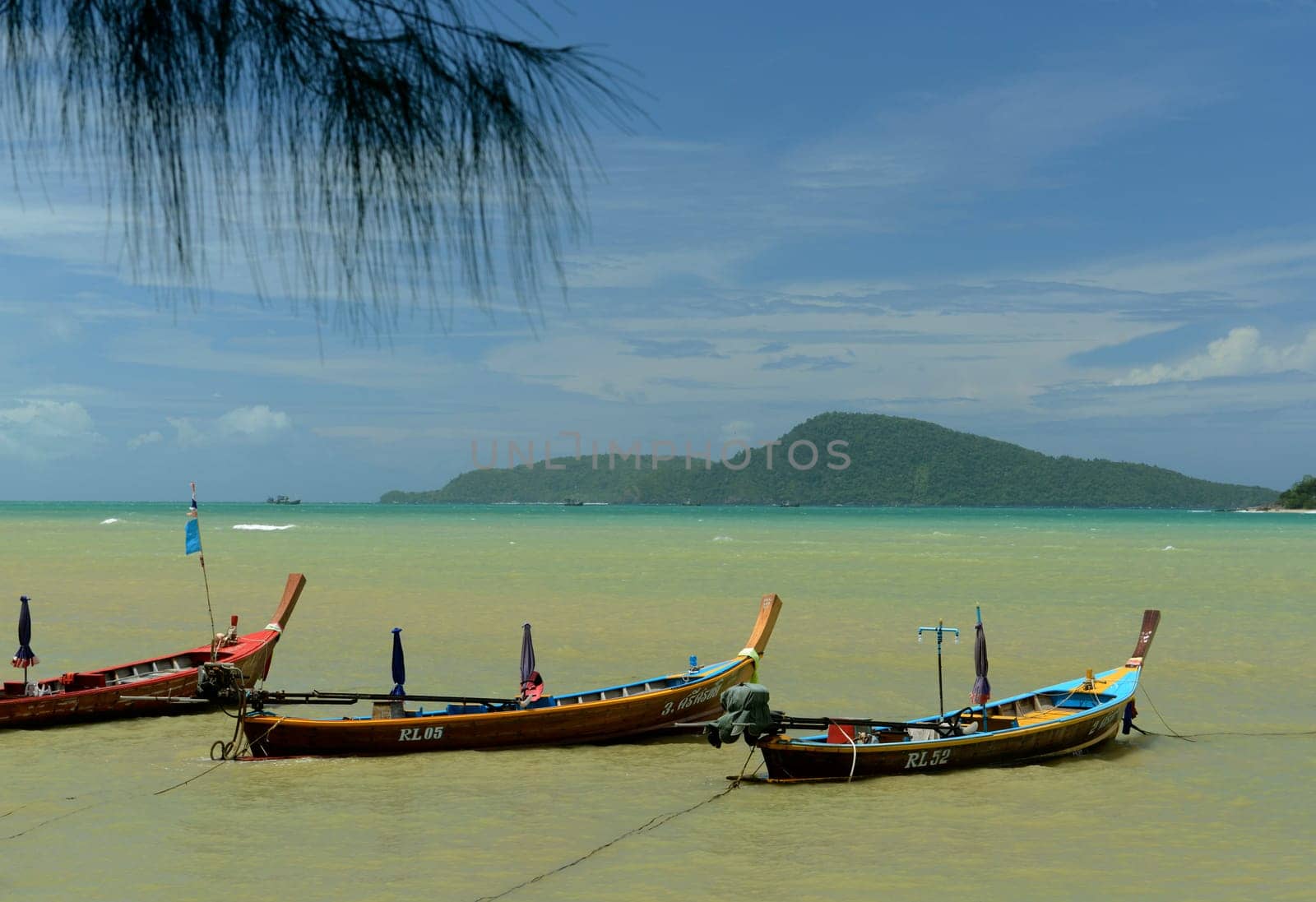 A beach in Rawai Beach in the south of Phuket Island in southern Thailand in South East Asia.