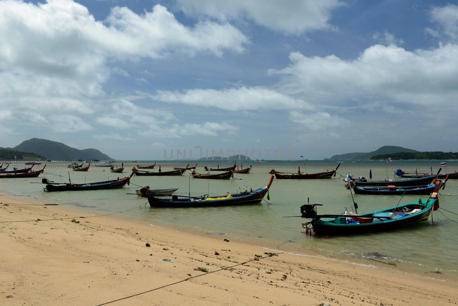 The beach in Rawai Beach in the south of the island of Phuket in the south of Thailand in South East Asia.