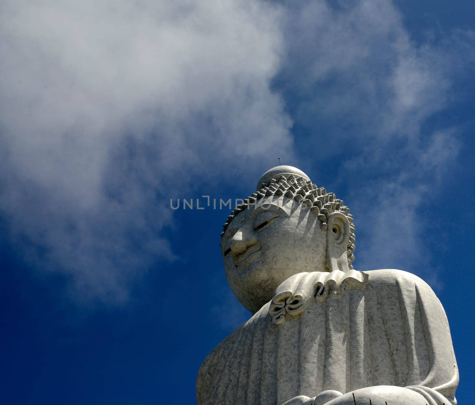 The Great Buddha at Wat Chalong in the mountains in the south of phuket island in southern Thailand in South East Asia.