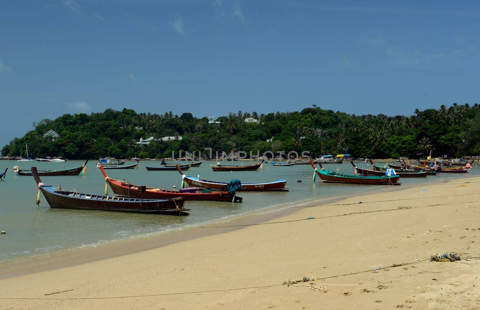 A beach in Rawai Beach in the south of Phuket Island in southern Thailand in South East Asia.