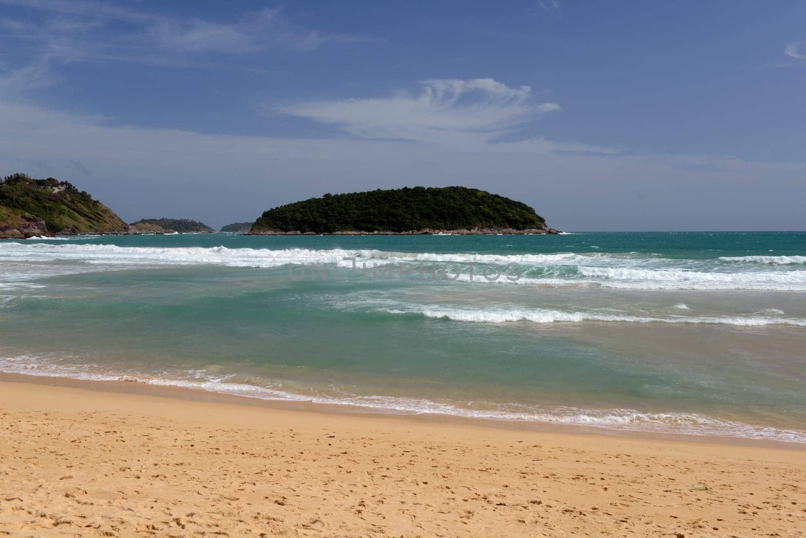 A beach in Hat Nai Harn in the south of phuket island in southern Thailand in South East Asia.