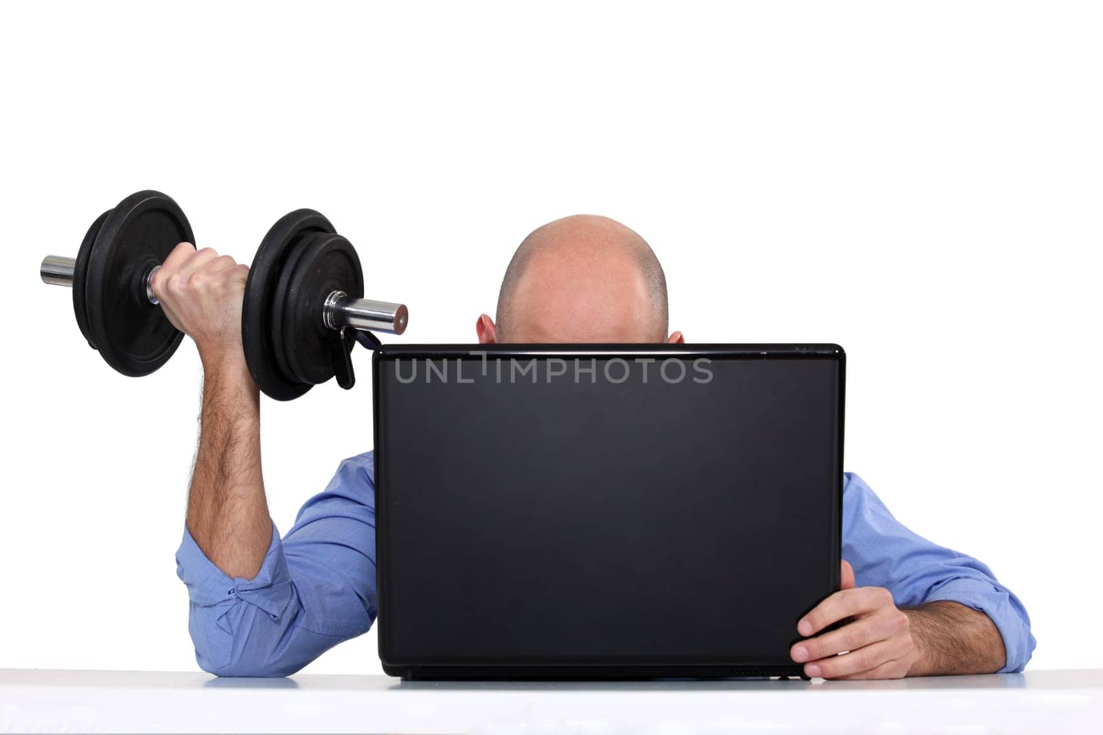 Businessman using weights
