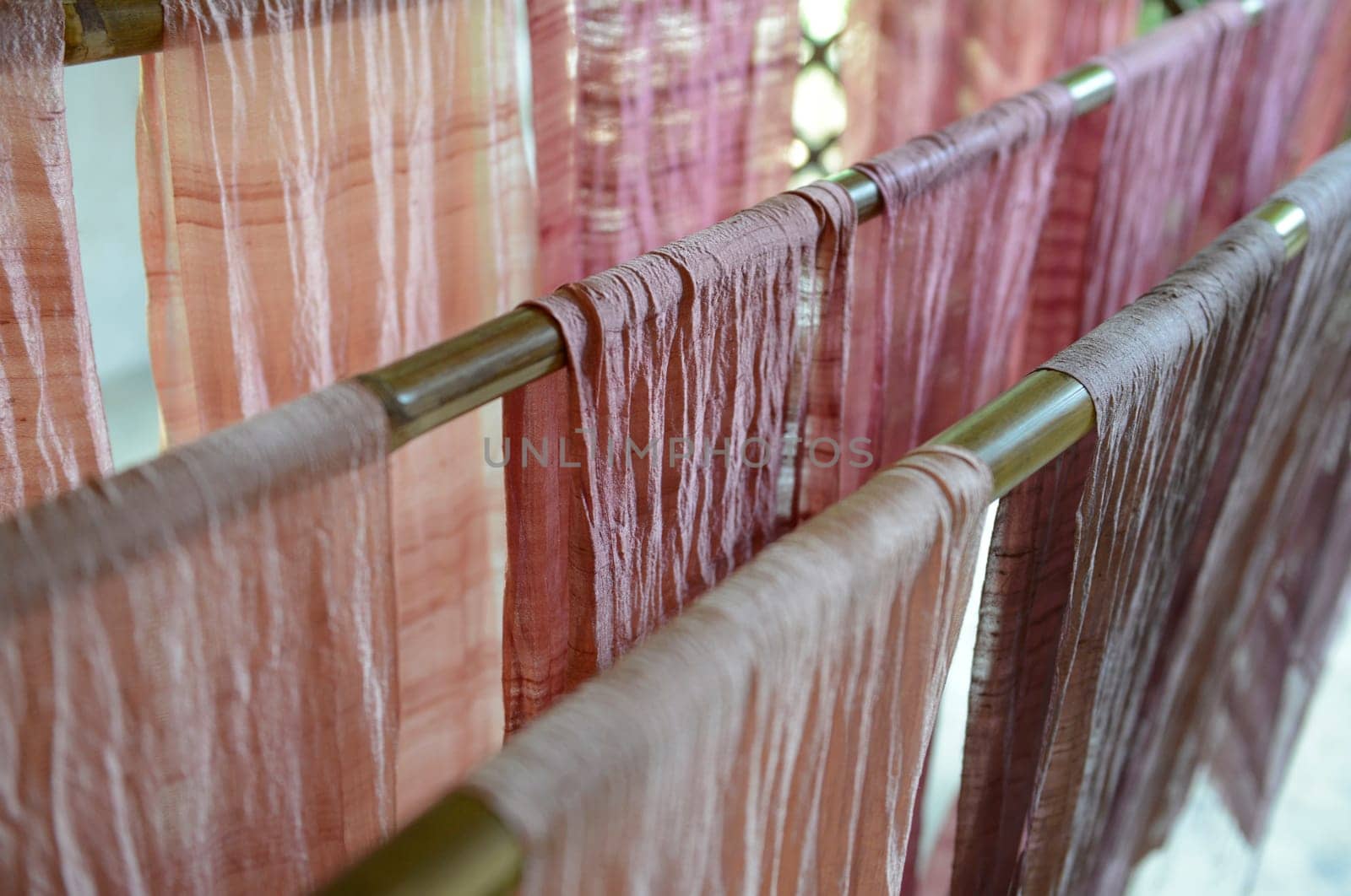 Silk fabric at a silk factory in Chiang Mai in northern Thailand in South East Asia.