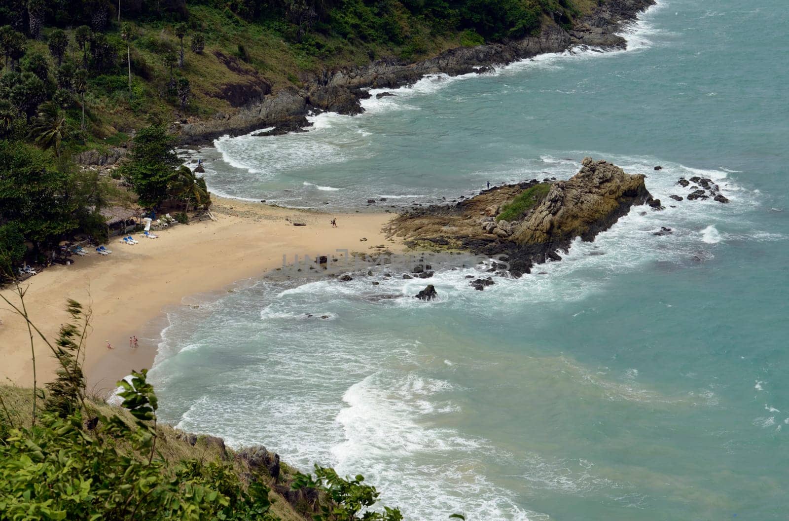 A beach in Hat Nai Harn in the south of phuket island in southern Thailand in South East Asia.